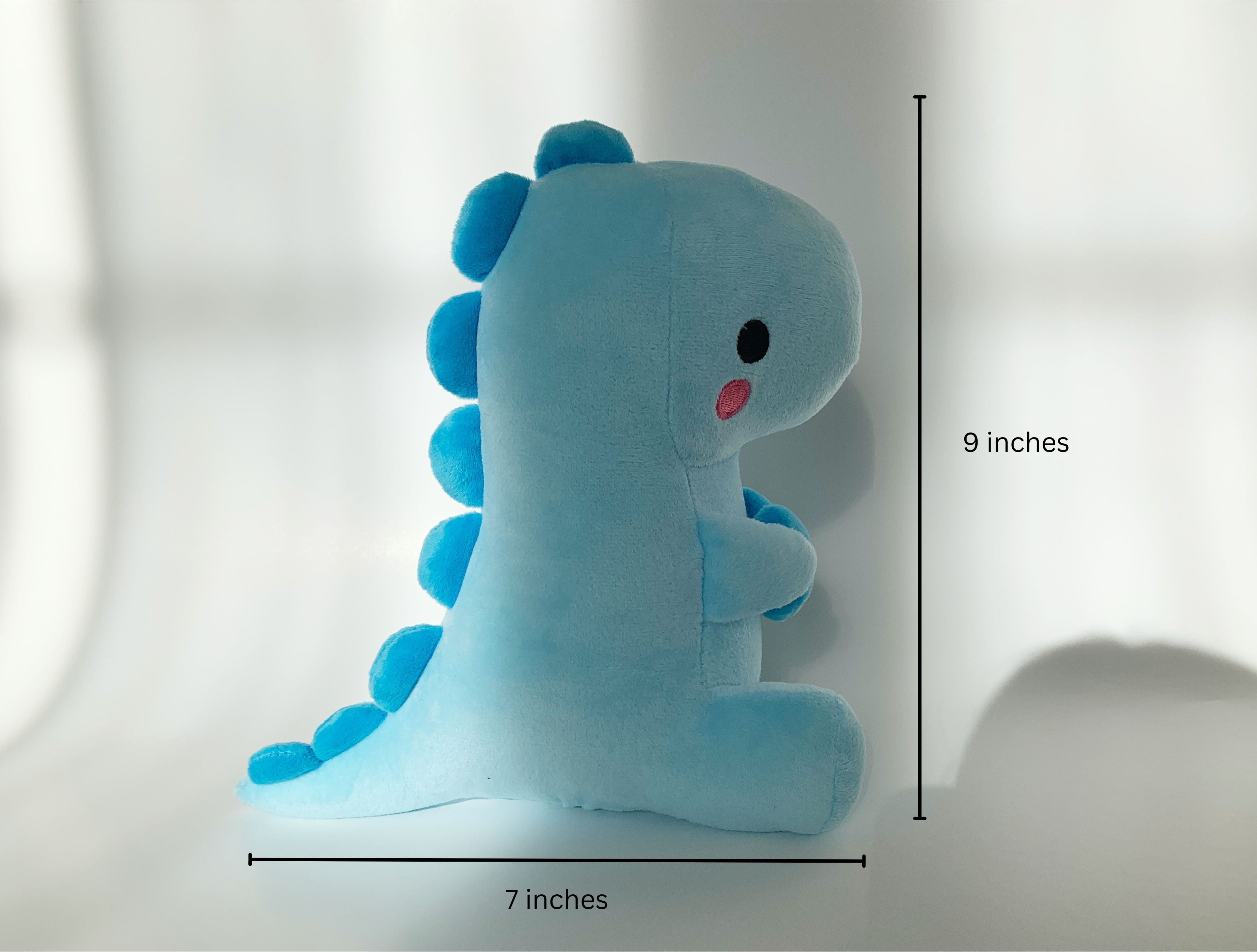 Blue dinosaur soft sales toy